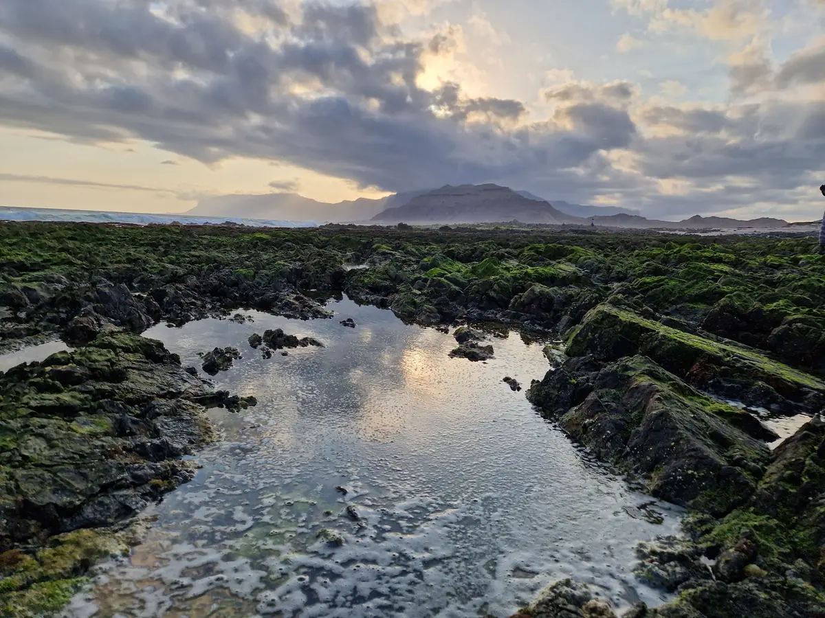 Rock pools at Ras Irissel, the eastern tip of the island, at dusk